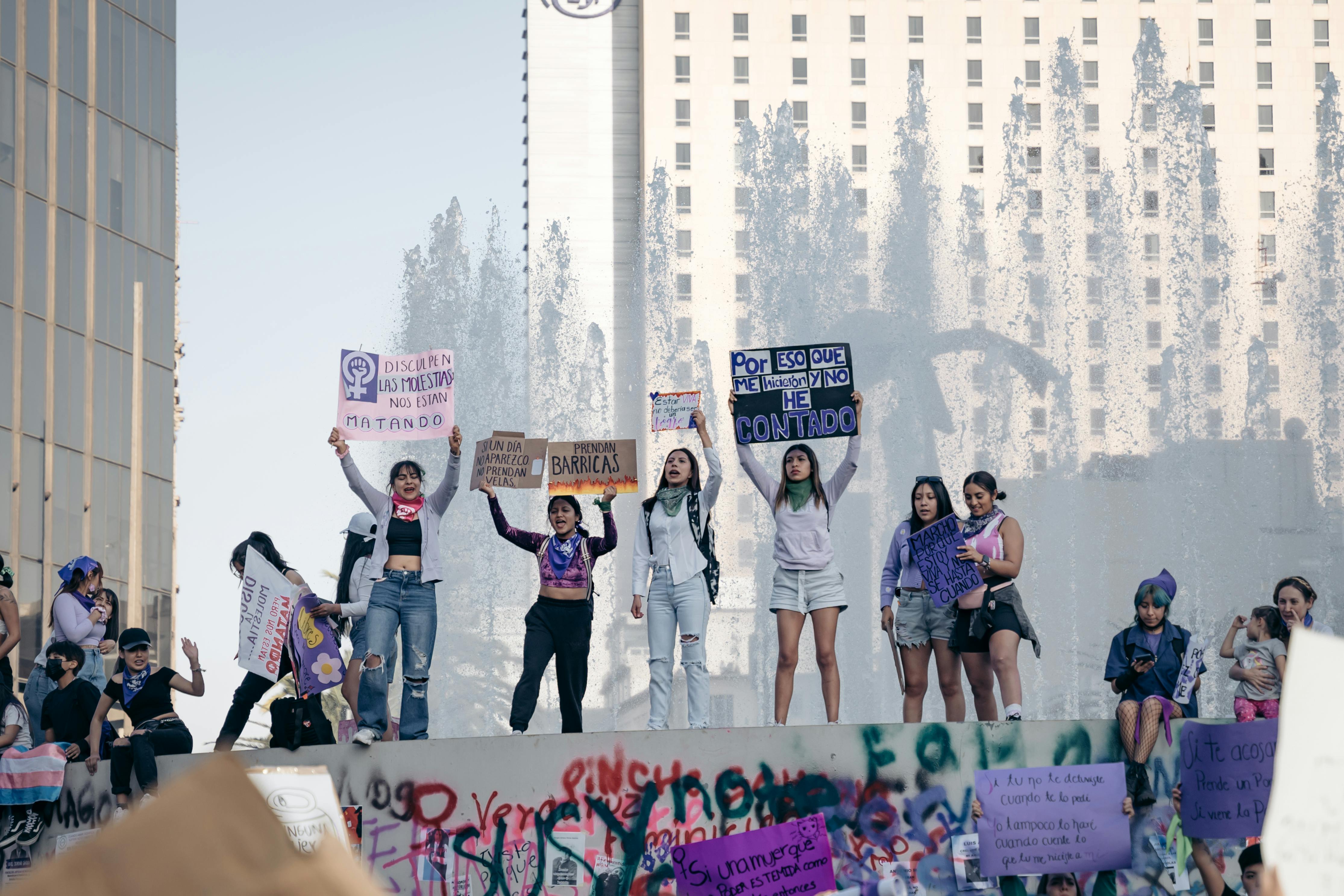 Determined protesters with signs, a visual metaphor for Priya Sharma's resilience and unwavering fight to achieve her Kellogg MBA admission against the odds.